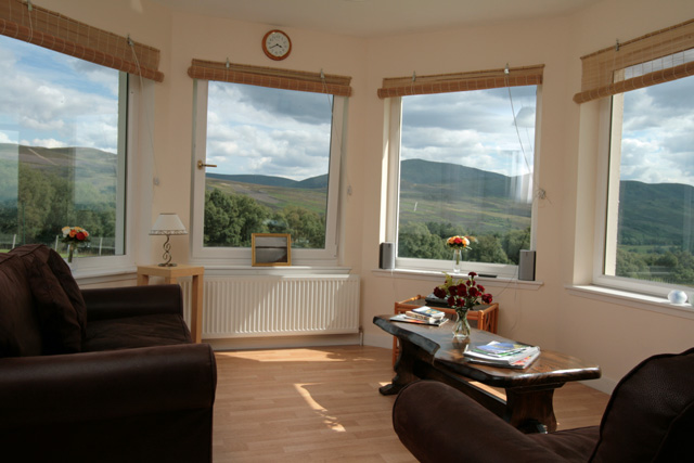 Conservatory with lovely views down the strath