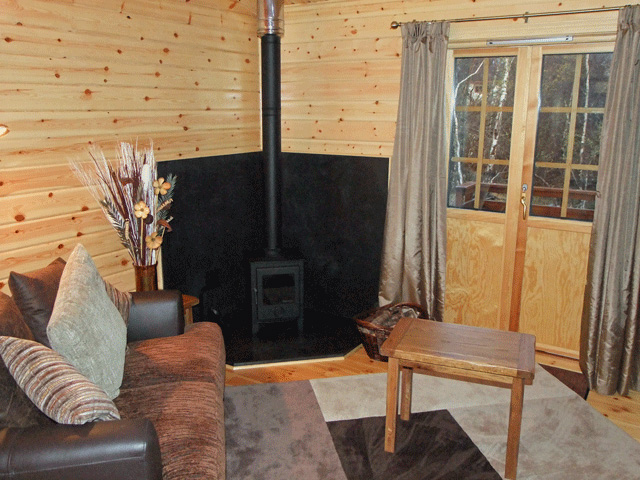Lounge has wood burning stove